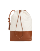 SOMEWHERE: Ivory canvas and tan leather sack bag