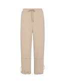 OUTCOME: Beige joggers with horizontal pleat below the knee