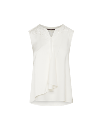 REPLY: Ivory sleeveless top with embroidered neckline
